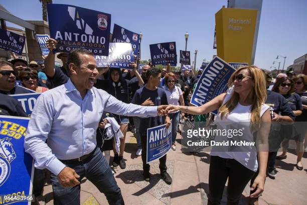 California Democratic gubernatorial candidate Antonio Villaraigosa dances at Mariachi Plaza in his childhood neighborhood of Boyle Heights as he...