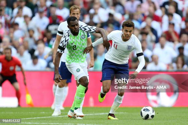 Bryan Idowu of Nigeria and Dele Alli of England during the International Friendly between England and Nigeria at Wembley Stadium on June 2, 2018 in...