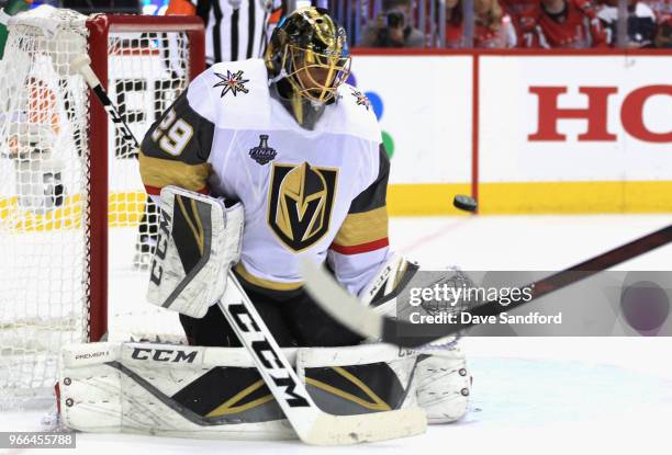 Goaltender Marc-Andre Fleury of the Vegas Golden Knights makes a save during the first period of Game Three of the 2018 NHL Stanley Cup Final against...