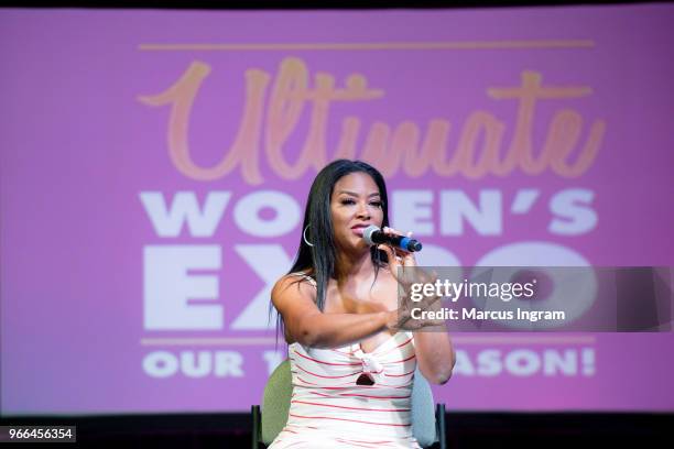 Actress Kenya Moore speaks on stage during the Atlanta Ultimate Women's Expo at Georgia World Congress Center on June 2, 2018 in Atlanta, Georgia.