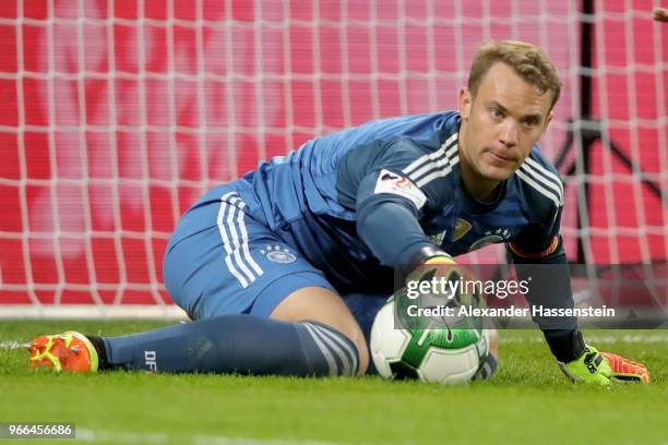 Manuel Neuer of Germany safes the ball during the International Friendly match between Austria and Germany at Woerthersee Stadion on June 2, 2018 in...