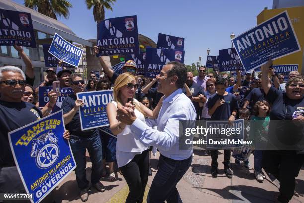 California Democratic gubernatorial candidate Antonio Villaraigosa dances at Mariachi Plaza in his childhood neighborhood of Boyle Heights as he...