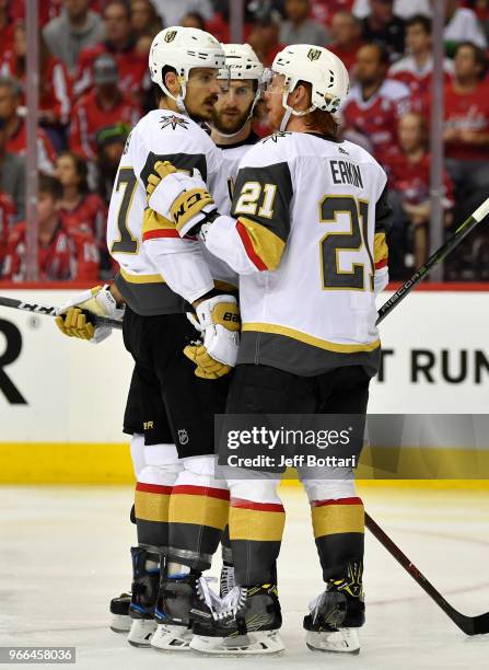 Cody Eakin and Luca Sbisa of the Vegas Golden Knights confer during a break in action during the second period against the Washington Capitals in...