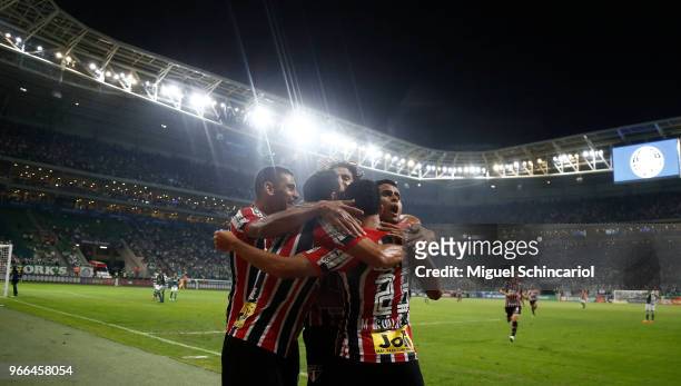 Marcos Guilherme of Sao Paulo celebrates his goal with a teammates after a scoring during a match between Palmeiras and Sao Paulo for the Brasileirao...