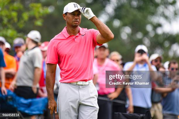 Tiger Woods gets ready to tee off on the 12th hole during the third round of the Memorial Tournament presented by Nationwide at Muirfield Village...