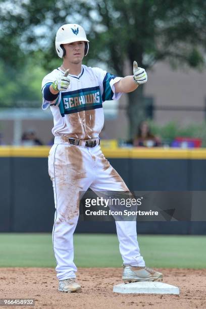 Wilmington infielder Doug Angeli gives the thumbs up after hitting a double during the NCAA Baseball Greenville Regional between the Ohio State...