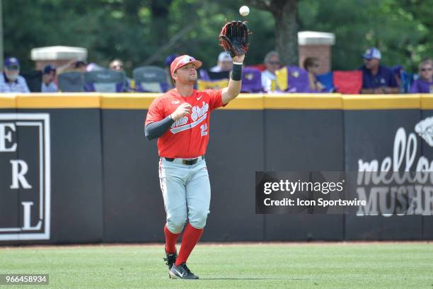 Ohio State outfielder Tyler Cowles makes a catch in the outfield during the NCAA Baseball Greenville Regional between the Ohio State Buckeyes and the...