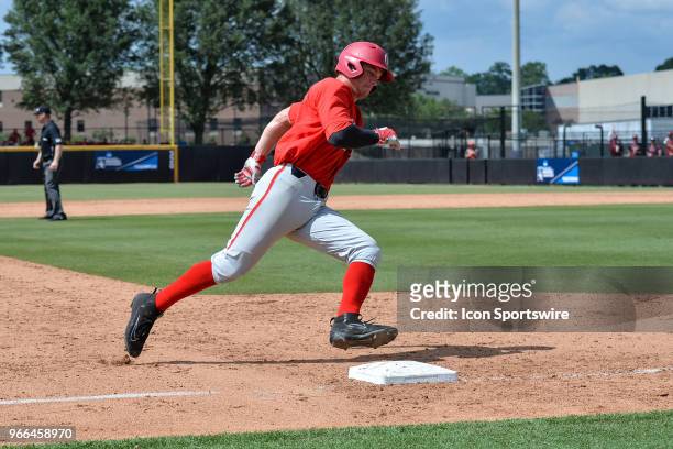 Ohio State catcher Dillon Dingler rounds third and heads to home during the NCAA Baseball Greenville Regional between the Ohio State Buckeyes and the...