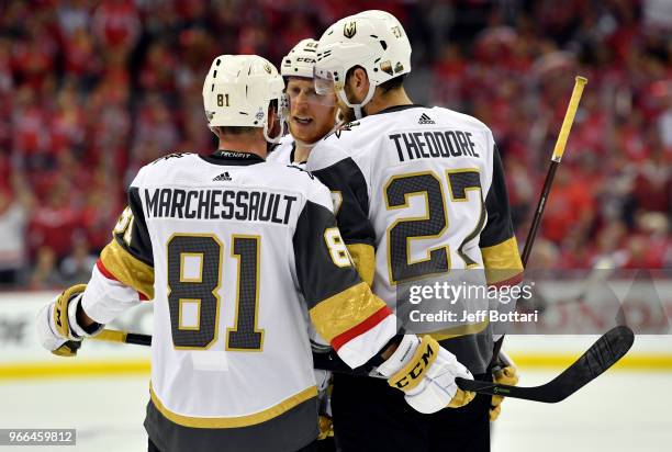 Jonathan Marchessault, Shea Theodore, and Cody Eakin of the Vegas Golden Knights confer during a break in action during the second period against the...