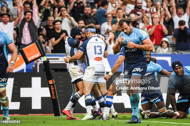 Players of Castres celebrates a try during the French Final Top 14 match between Montpellier and Castres at Stade de France on June 2, 2018 in Paris,...