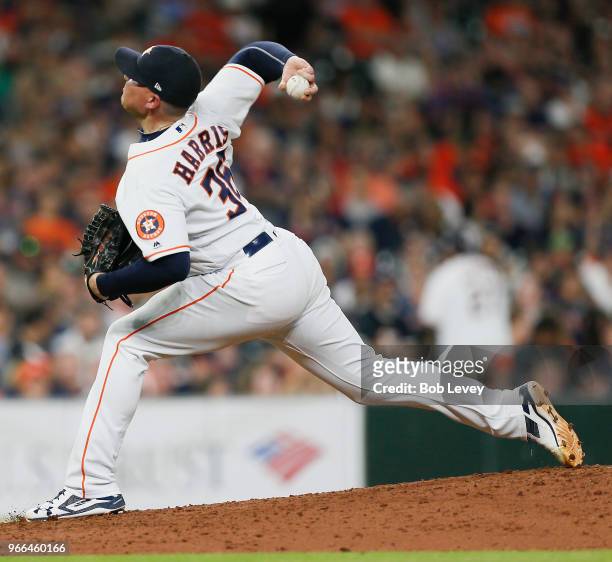 Will Harris of the Houston Astros pitches in the seventh inning against the Boston Red Sox at Minute Maid Park on June 2, 2018 in Houston, Texas.