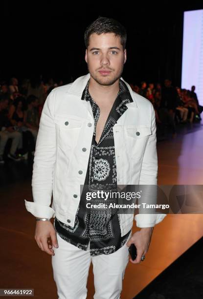 William Valdes is seen front row at the Custo Barcelona fashion show during Miami Fashion Week 2018 at Ice Palace Studios on June 2, 2018 in Miami,...