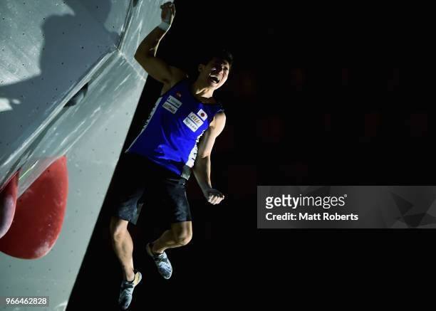 Rei Sugimoto of Japan celebrates during the Men's semi-final on day two of the IFSC World Cup Hachioji at Esforta Arena Hachioji on June 3, 2018 in...