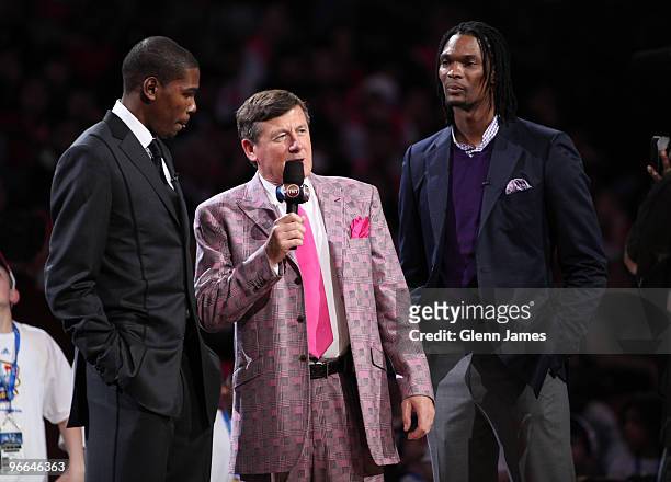 Personality Craig Sager talks with NBA All-Stars Kevin Durant and Chris Bosh prior to tip off of the T-Mobile Rookie Challenge and Youth Jam as part...