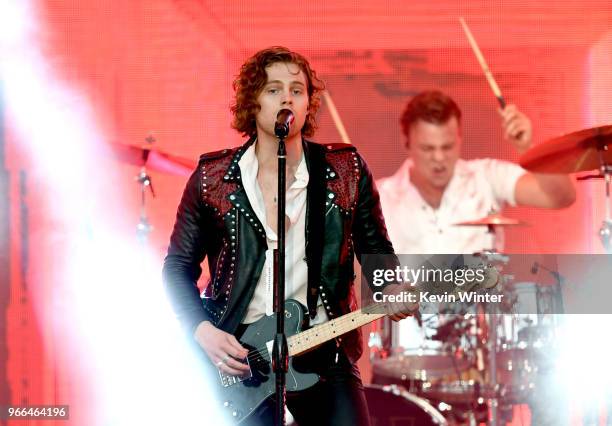 Luke Hemmings and Ashton Irwin of music group 5 Seconds of Summer perform onstage during the 2018 iHeartRadio Wango Tango by AT&T at Banc of...