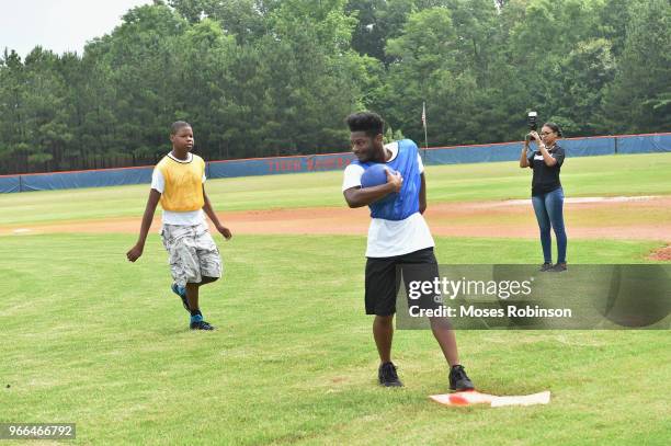 Atmosphere at McFadden Youth Foundation Kickoff Kick Ball & Family Fun Event at Mundy's Mill High School on June 2, 2018 in Atlanta, Georgia.