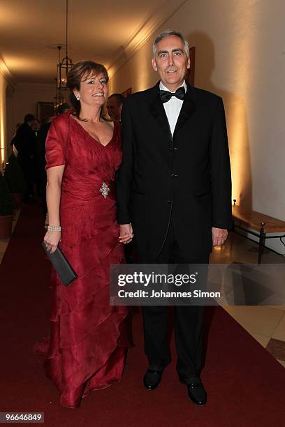 Peter Loescher , president and chief executive officer of Siemens AG and his wife arrive for the Hubert Burda Birthday Reception at Munich royal...