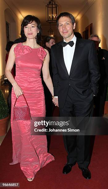 Rene Obermann and Maybrit Illner arrive for the Hubert Burda Birthday Reception at Munich royal palace on February 12, 2010 in Munich, Germany.