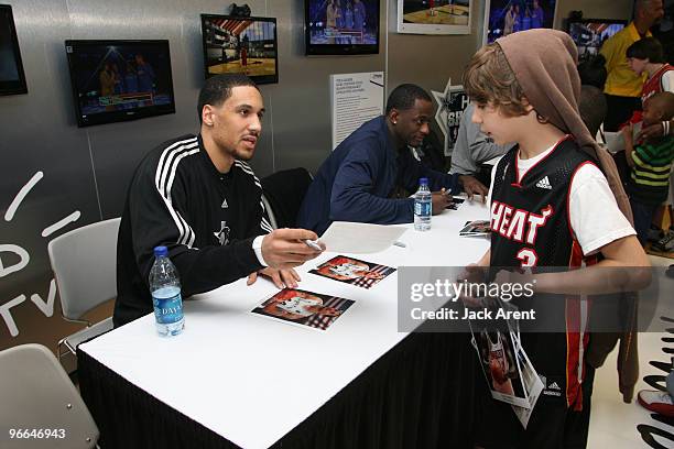 Dwayne Jones of the Austin Toros and Earl Barron of the Iowa Energy sign autographs at the Haier venue during All Star Weekend on February 12, 2010...