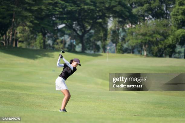 perfect golf shot - professional golfer stock pictures, royalty-free photos & images