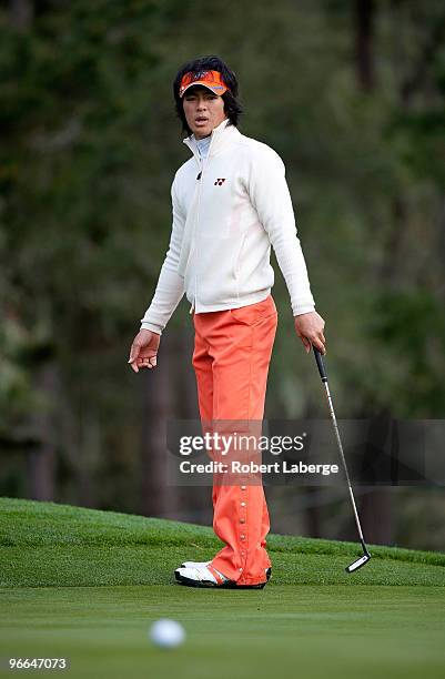 Ryo Ishikawa of Japan attempts a putt on the eight green during a practice round for the AT&T Pebble Beach National Pro-Am at the Spyglass Hill Golf...