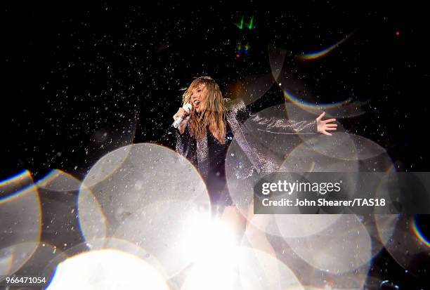 Taylor Swift, Swift performs onstage during the 2018 reputation Stadium Tour at Soldier Field on June 2, 2018 in Chicago, Illinois.