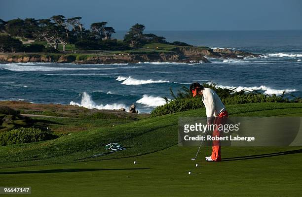 Ryo Ishikawa of Japan practices his putting on the fifth green during a practice round for the AT&T Pebble Beach National Pro-Am at the Spyglass Hill...