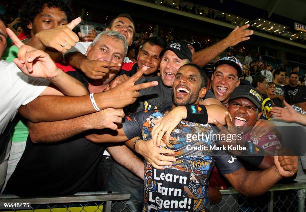 Preston Campbell of the Indigenous All Stars celebrates with the crowd after his team's win in the Indigenous All Stars and the NRL All Stars match...