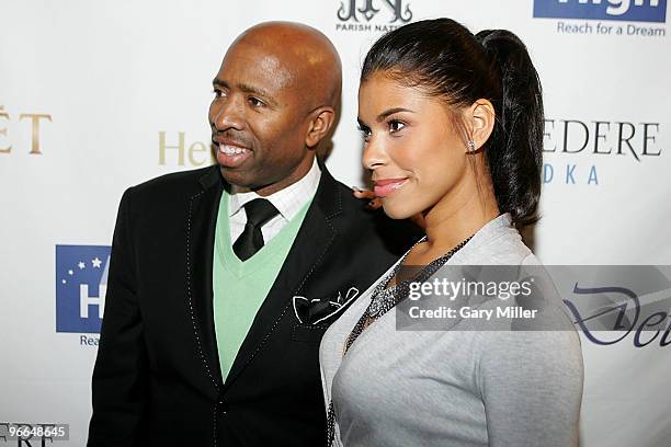 Kenny Smith and his wife Gwen Smith on the red carpet for the Kenny Smith All-Star Bash at Deux Lounge on February 12, 2010 in Dallas, Texas.