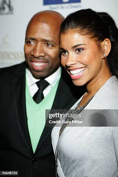 Kenny Smith and his wife Gwen Smith on the red carpet for the Kenny Smith All-Star Bash at Deux Lounge on February 12, 2010 in Dallas, Texas.