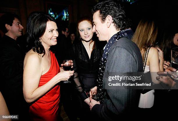 Iris Berben talks to Oliver Berben and Barbara Meier during the 'Festival Night' during the 60th Berlin International Film Festival at the Palais am...