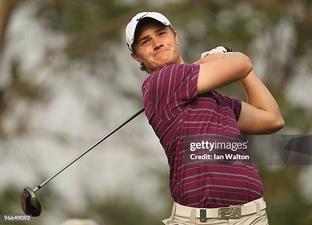 Oliver Fisher of England in action during Round Three of the Avantha Masters held at The DLF Golf and Country Club on February 13, 2010 in New Delhi,...