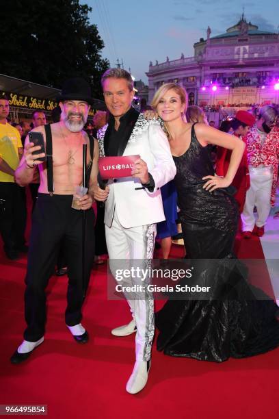 Gedeon Burkhard, Alfons Haider, Miriam Weichselbraun during the Life Ball 2018 at City Hall on June 2, 2018 in Vienna, Austria. The Life Ball, an...