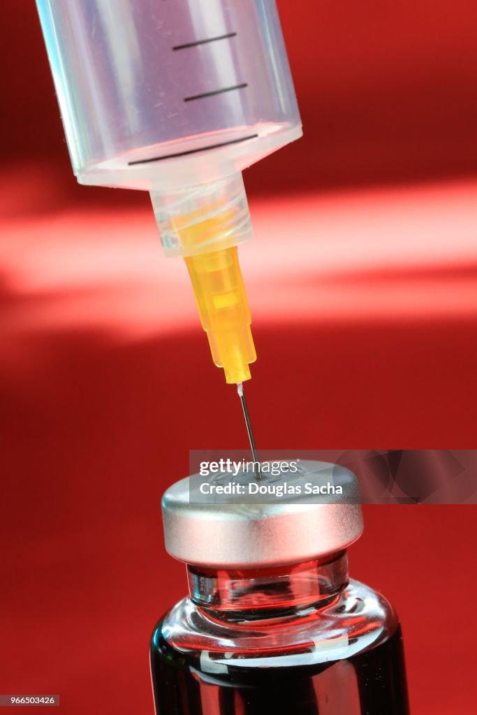 Disposable syringe and vaccine