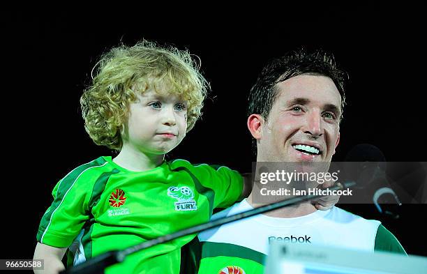 Robbie Fowler of the Fury with his son Jacob speak to the crowd at the completion of the round 27 A-League match between North Queensland Fury and...