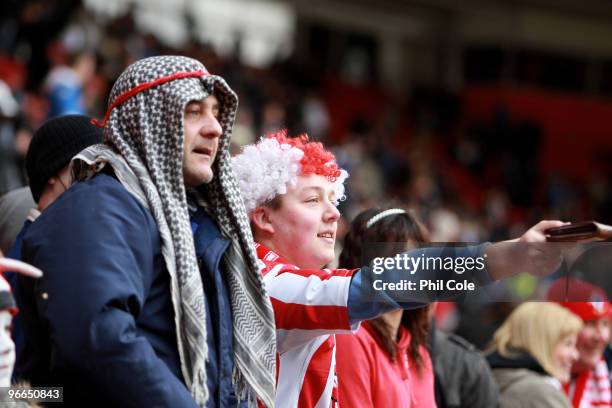 Southampton fans taunt Portsmouth players with their wallets during the FA Cup sponsored by E.ON fifth round match between Southampton and Portsmouth...