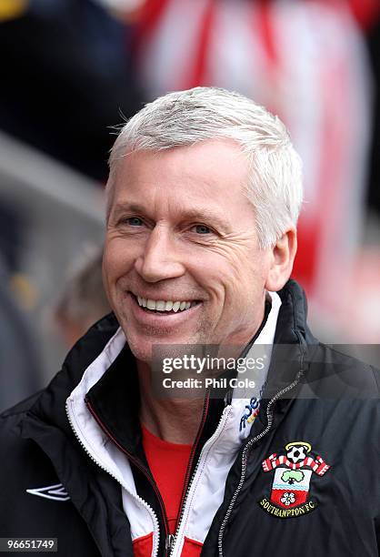 Alan Pardew Manager of Southampton smiles before the FA Cup sponsored by E.ON fifth round match between Southampton and Portsmouth at St Mary's...