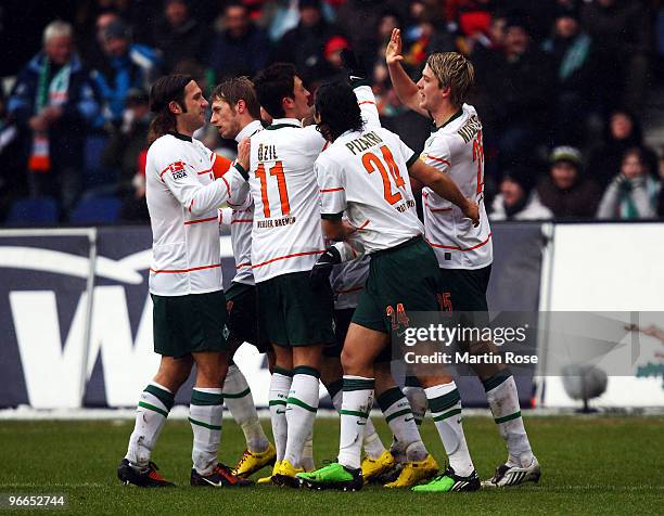 Peter Niemeyer of Bremen celebrate with his team mates after he scores his team's 1st goal during the Bundesliga match between Hannover 96 and SV...