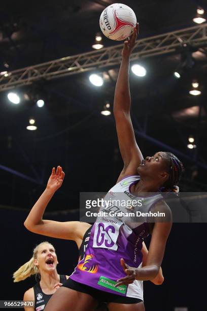Romelda Aiken of the Firebirds reaches for the ball during the round five Super Netball match between the Magpies and the Firebirds at the Launceston...
