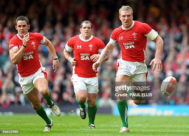 Welsh flanker Andy Powell chases the ball during the RBS Six Nations International rugby union match between Wales and Scotland at The Millennium...