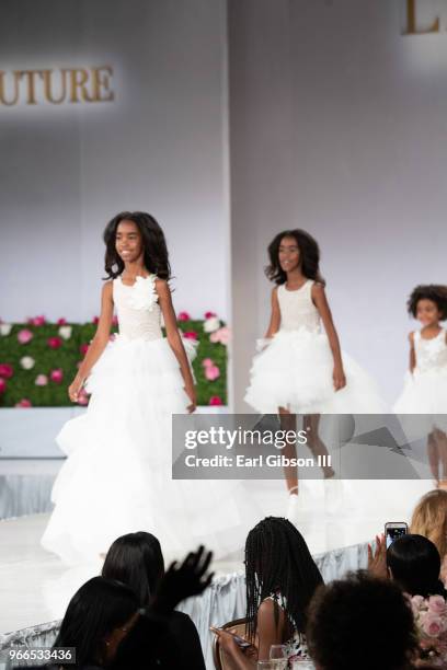 Lila Star Combs and Jessie James Combs walk the catwalk at the Ladylike Foundation's 2018 Women Of Excellence Scholarship Luncheon at The Beverly...