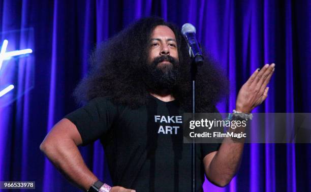 Reggie Watts performs onstage during 'All Bag And A Bag of Chips: 90's Dance Party' in the Larkin Comedy Club during Clusterfest at Civic Center...