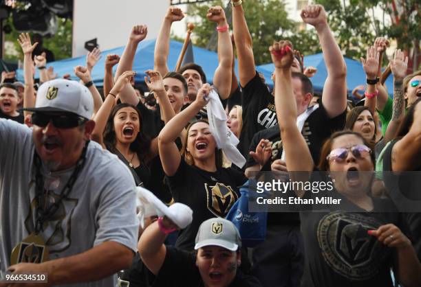 Vegas Golden Knights fans react after Tomas Nosek of the Golden Knights scored a third-period goal against the Washington Capitals at a Golden...