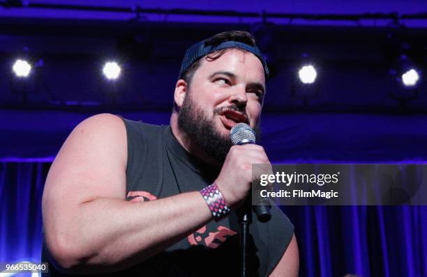 Jon Grabus performs onstage during 'All Bag And A Bag of Chips: 90's Dance Party' in the Larkin Comedy Club during Clusterfest at Civic Center Plaza...