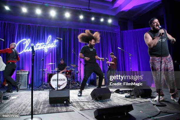 Reggie Watts and Jon Grabus perform onstage during 'All Bag And A Bag of Chips: 90's Dance Party' in the Larkin Comedy Club during Clusterfest at...