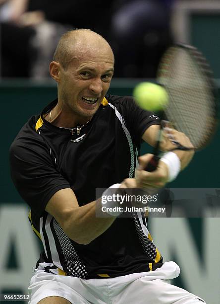 Nikolay Davydenko of Russia in action in his match against Robin Soderling of Sweden during day six of the ABN AMBRO World Tennis Tournament on...