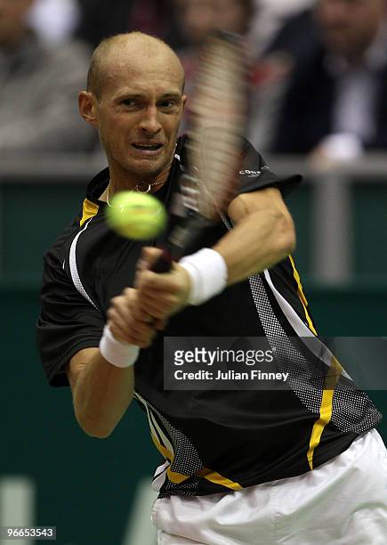 Nikolay Davydenko of Russia in action in his match against Robin Soderling of Sweden during day six of the ABN AMBRO World Tennis Tournament on...