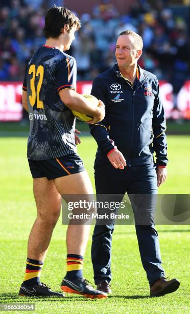 Don Pyke, coach of the Adelaide Crows chats to Darcy Fogarty of the Adelaide Crows before the round 11 AFL match between the Adelaide Crows and the...