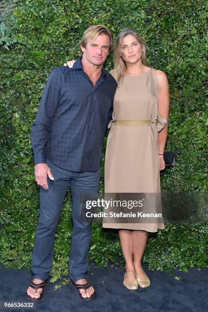 Laird Hamilton and Gabrielle Reece attend Chanel Dinner Celebrating our Majestic Oceans, A Benefit for NRDC at Private Residence on June 2, 2018 in...