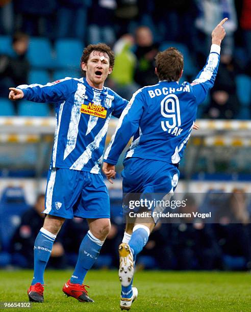 Stanislav Sestak of Bochum celebrates scoring his team's first goal with team mate Paul Freier during the Bundesliga match between VfL Bochum and...